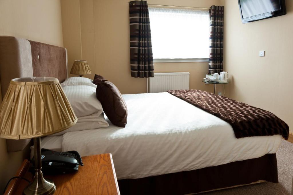 Caledonia Hotel Рисайт Стая снимка